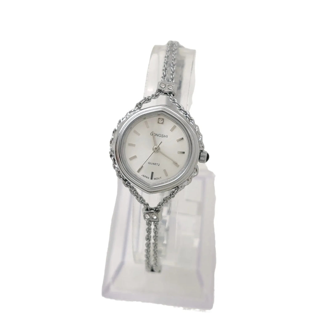 Ladies Mori-style quartz watch with 25mm dial on a metal chain strap in gold colour.
