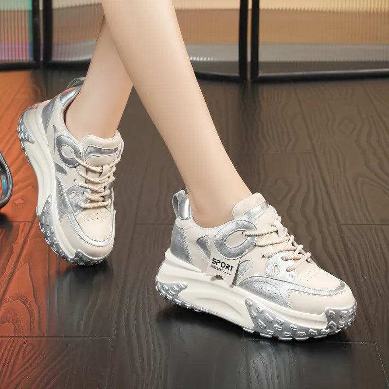 Leather sports casual shoes with thick rubber sole and lace-up fastening in multiple colours.