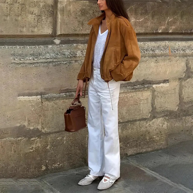Retro solid colour loose-fit long sleeve jacket on a hanger.