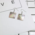 Women's natural shell earrings in geometric square and rectangular shapes with retro styling
