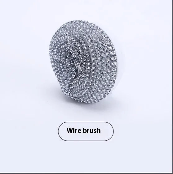 White cordless electric cleaning brush with multiple brush heads on charging dock