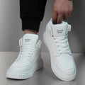 Men's white casual shoes with round toe and microfiber upper on a plain background.