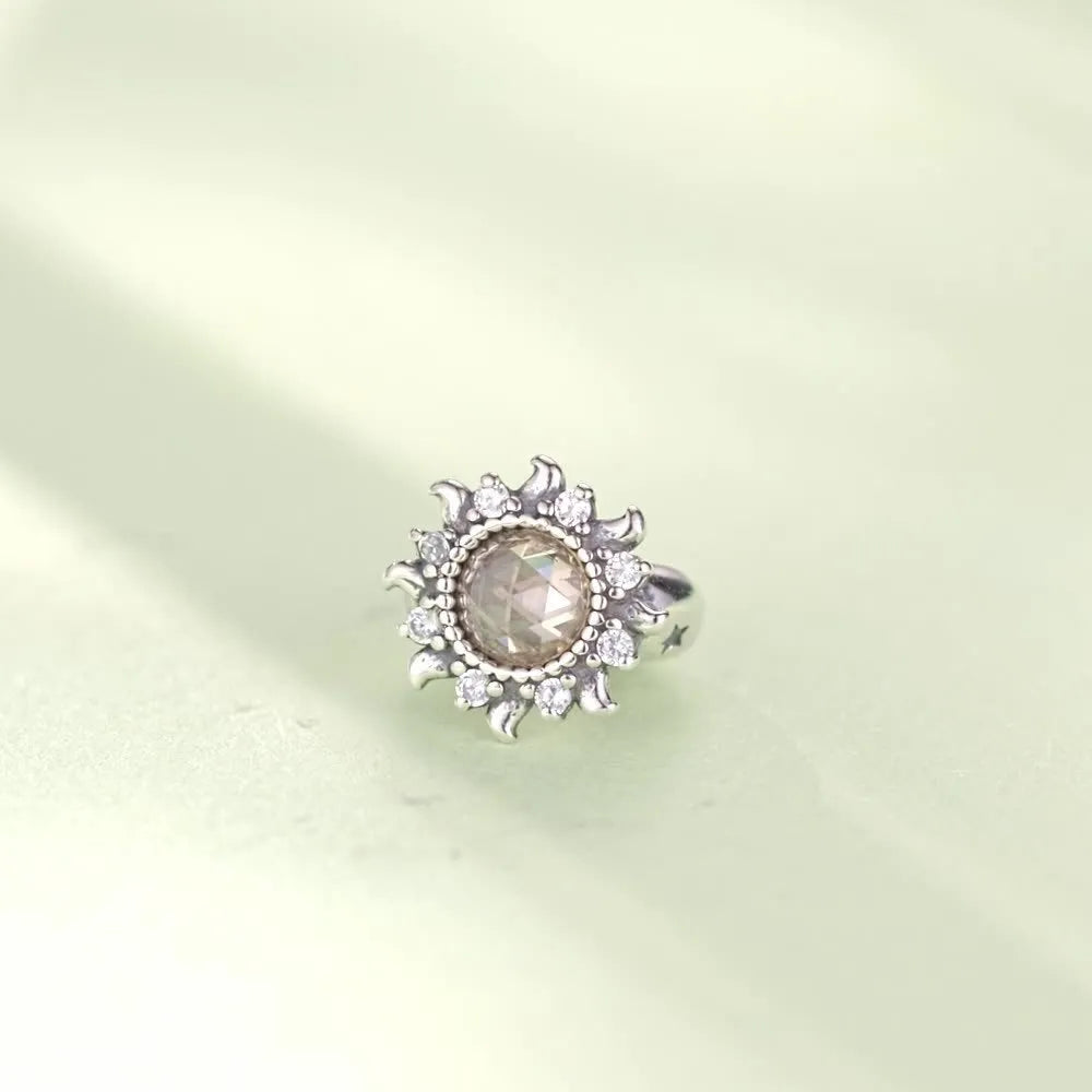 S925 sterling silver sunflower spacer bead with silicone positioning, 0.9cm height and width, 0.45cm aperture, on white background