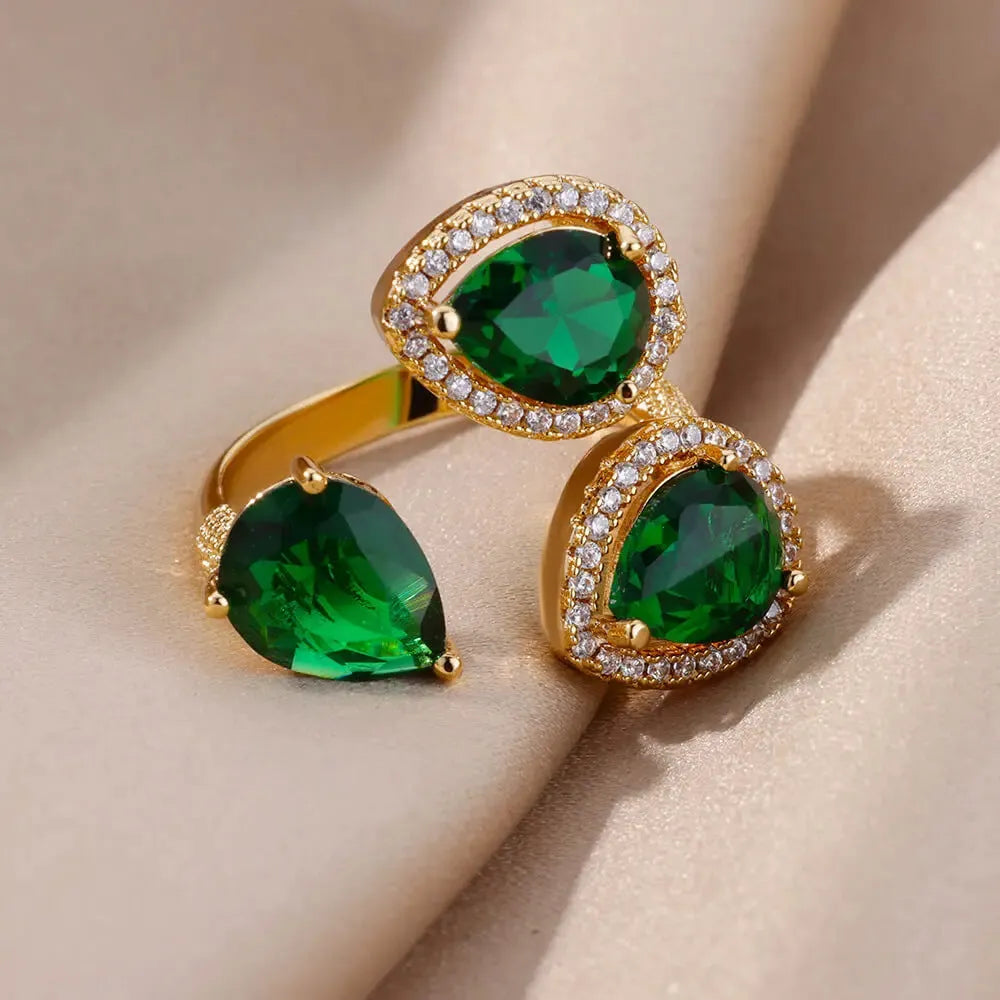 Green zircon flower ring with adjustable open-mouth stainless steel band, sizes 6 to 8, retro geometric design
