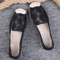 Women's flat linen fisherman shoes in white with a round toe and rubber sole.