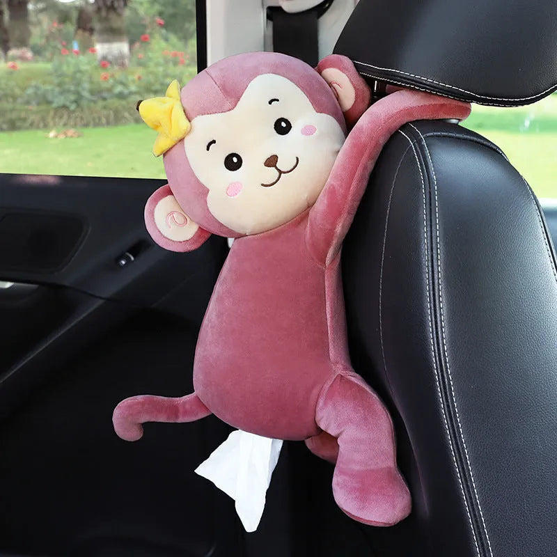 Soft plush car headrest tissue box holder in a cute animal character style.