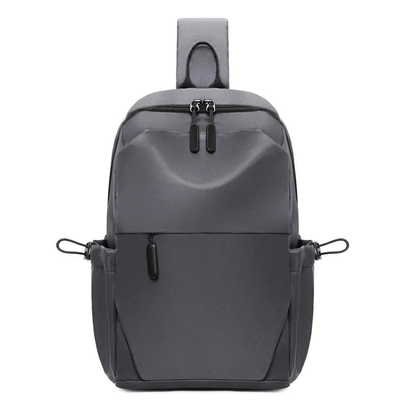 Grey waterproof polyester chest bag for men showing shoulder strap and main compartment