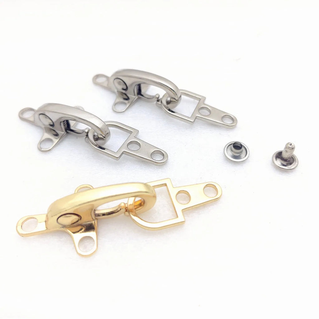 Zinc alloy metal aircraft-shaped hanging buckle decoration in bronze, gold, gun colour, or silver finish.
