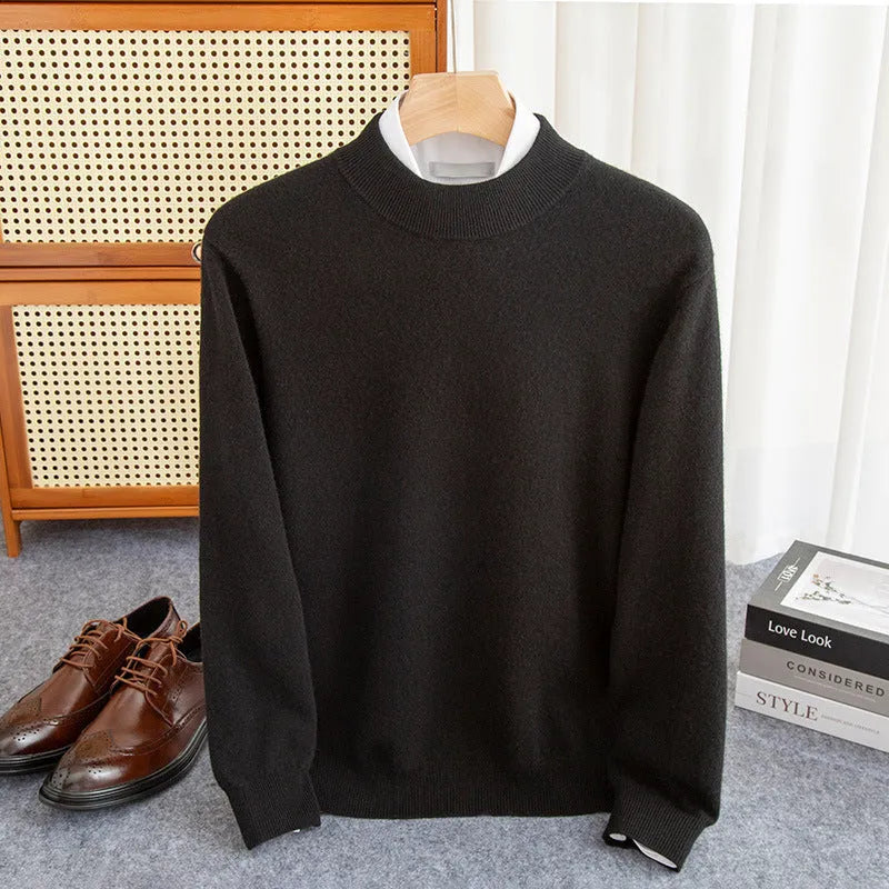 A man wearing a half-collar loose-fit wool sweater in a light business style, shown in a neutral colour.