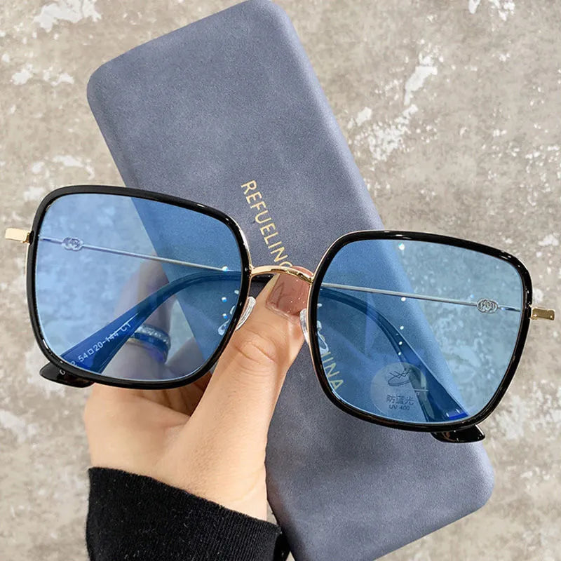 Photochromic myopia glasses with large frame, anti-blue light lens, available in four black gold frame colours