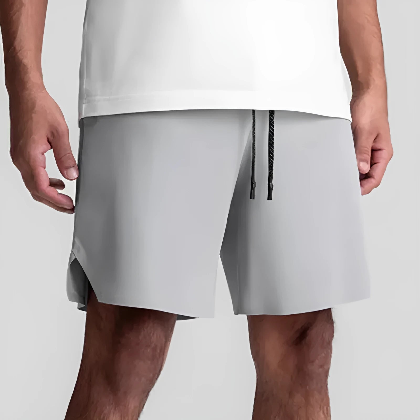 Men's grey seamless sports shorts with straight-leg knee-length design for athletic wear
