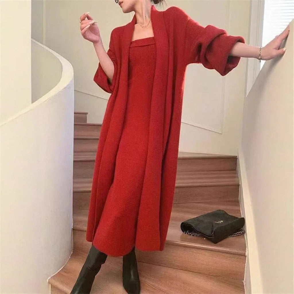 Women's grey knitted dress with matching cardigan coat, featuring regular sleeves and a long skirt.