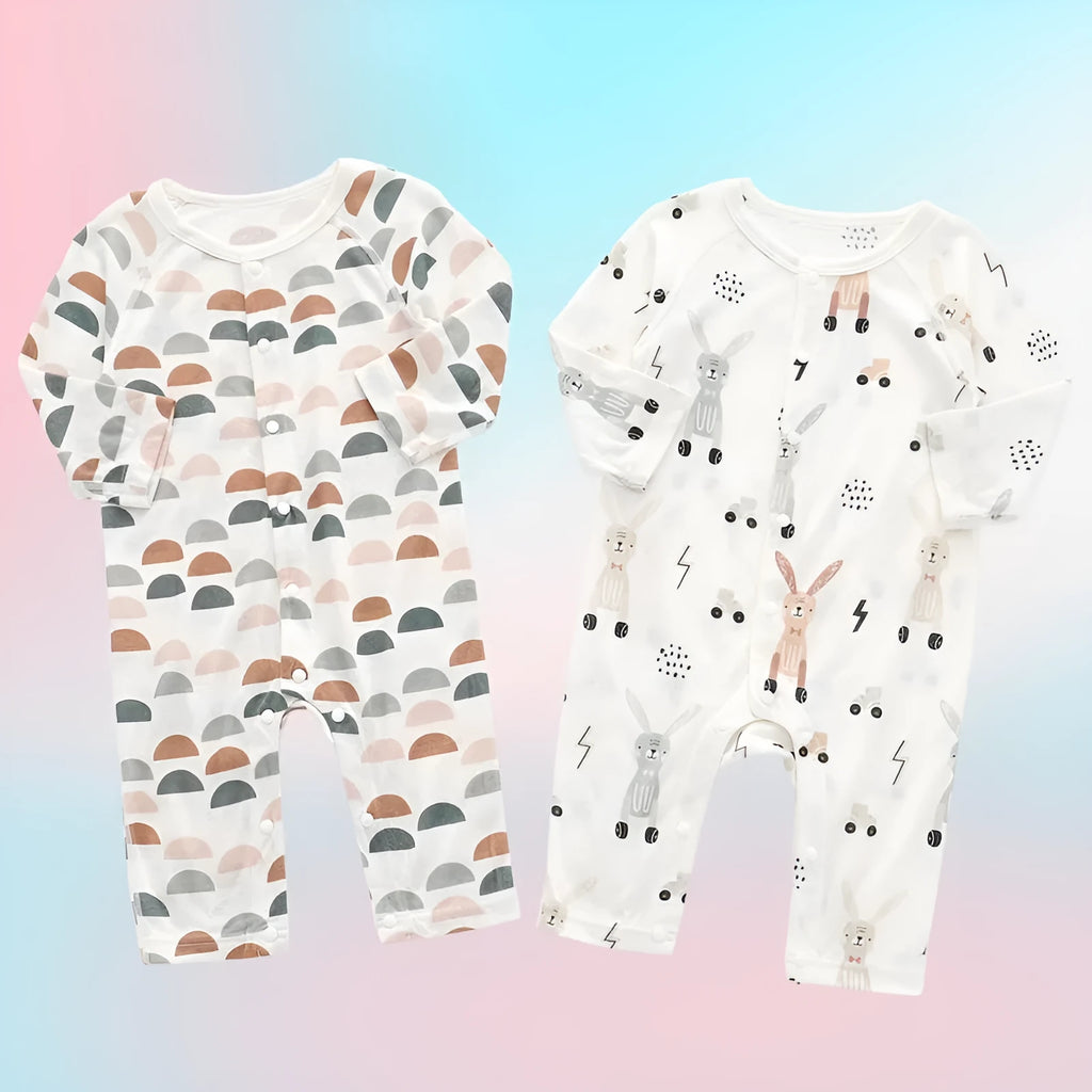 Baby wearing a soft bamboo fibre jumpsuit with a cute Nordic animal print, long sleeves.