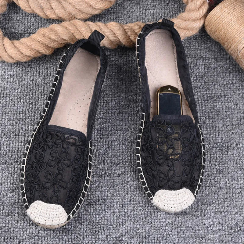 Women's flat linen fisherman shoes in white with a round toe and rubber sole.