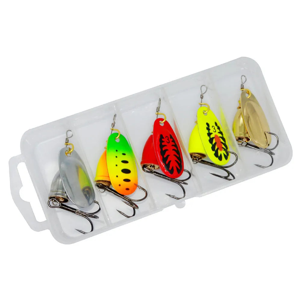 R composite rotating sequins and copper bell metal fishing lure in seven colour options on a blue background.