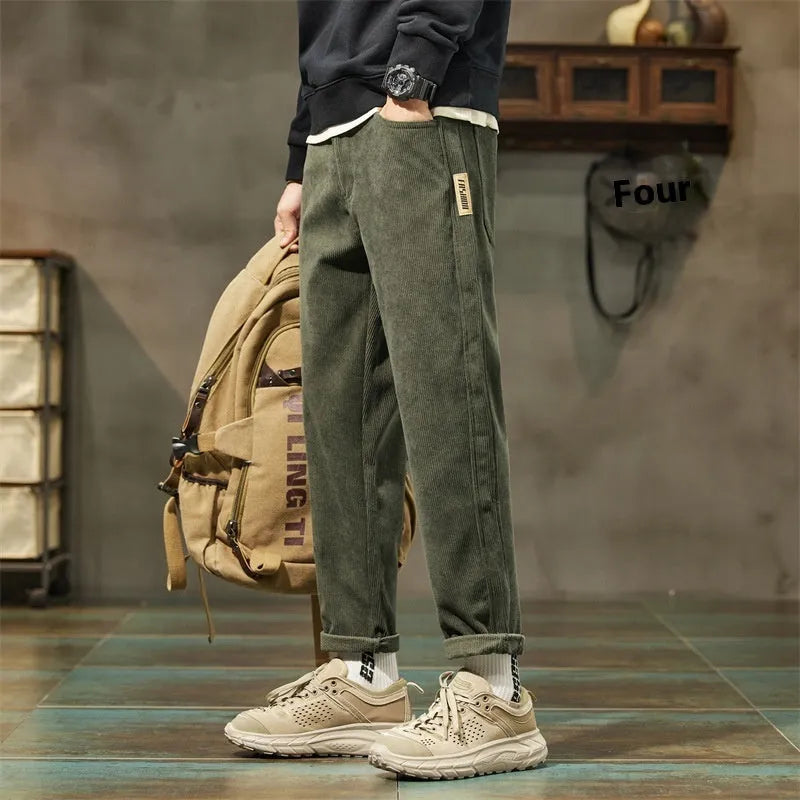 Corduroy men's straight-leg casual trousers in tapered street fashion style with mid-waist design