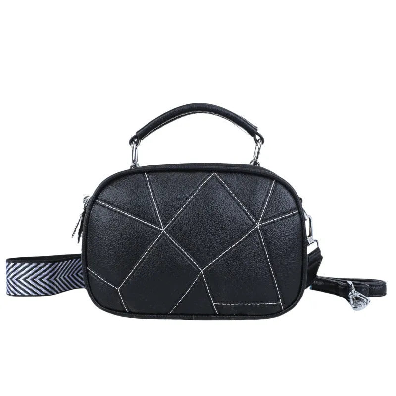 Small round patchwork bag in PU with visible stitching details, shown in beige colour