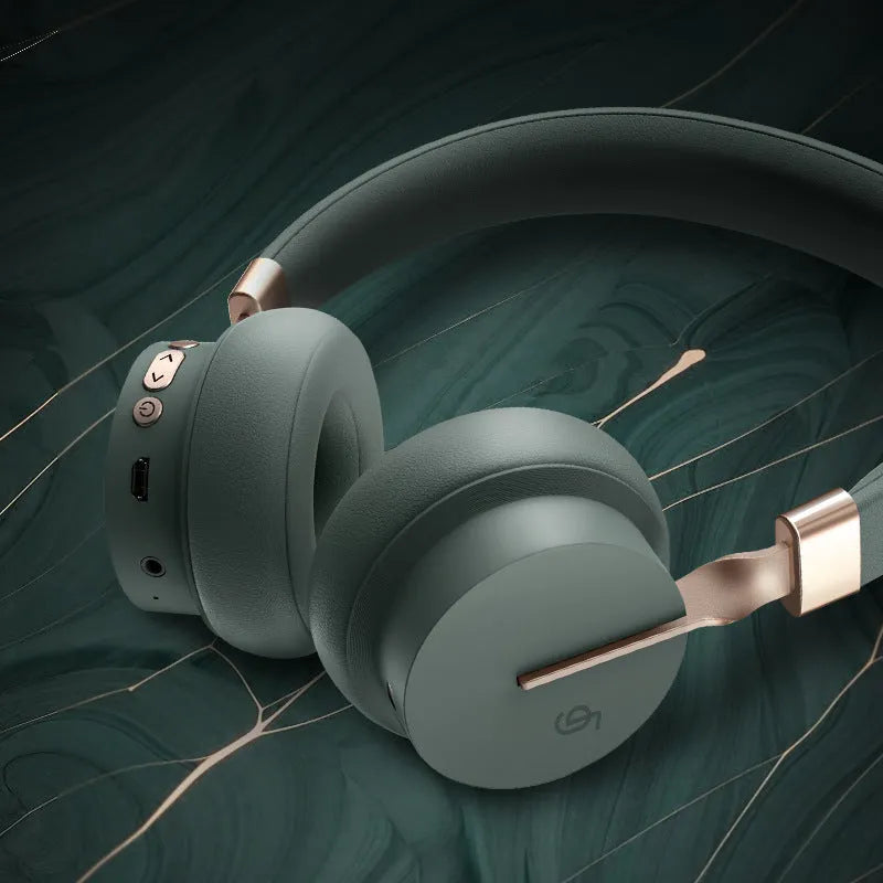 Solid colour Bluetooth headset for phone calls and music in black, blue, green, red, or white options.
