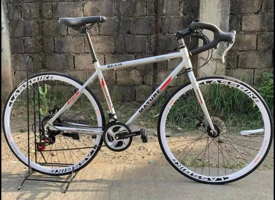 Aluminium alloy road bike with flat handlebar, 48cm frame, matted blue colour