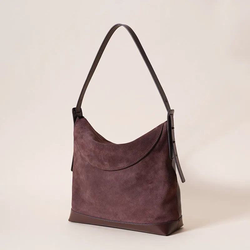 Genuine leather women's shoulder bag in brown with clamshell design and European retro styling