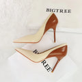 Women's retro style stiletto heel pumps in black with pointed toe and super high heel for banquet occasions