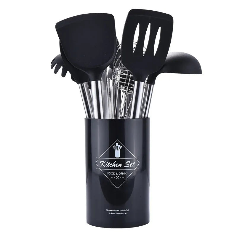 Seven-piece silicone kitchenware set includes spatula, colander, egg beater and other utensils with stainless steel tube handles in red colour