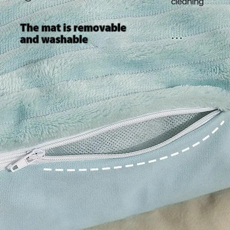 Large grey washable sofa dog bed mat with removable cover on a sofa.