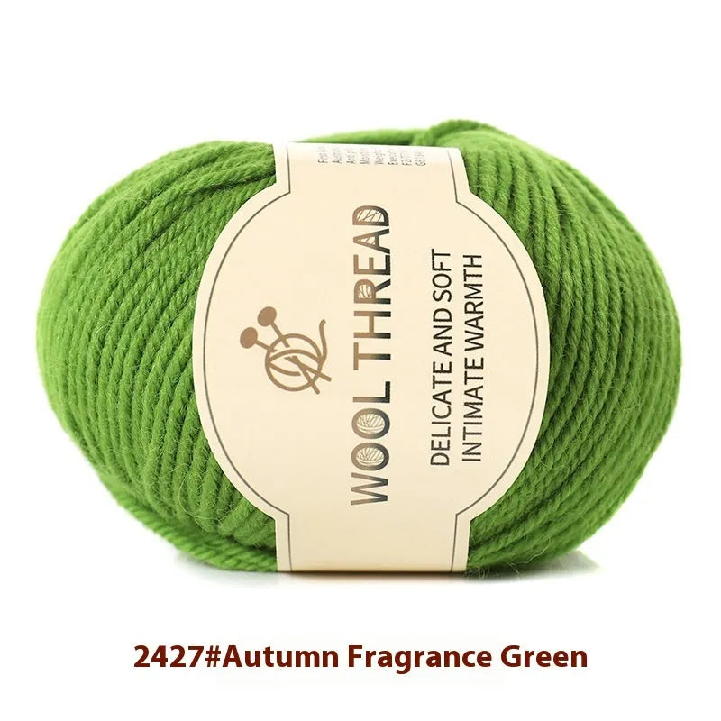Roll of woolen hand-knitting yarn in a selected colour for baby sweaters and scarves