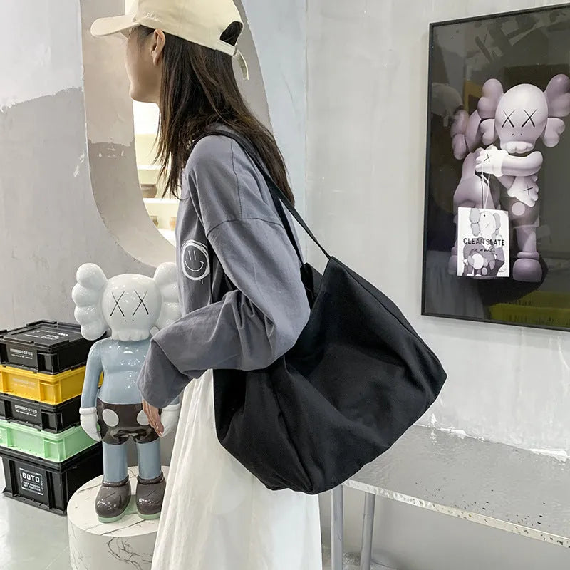 Solid colour women's canvas handbag with double shoulder straps and mobile phone compartment