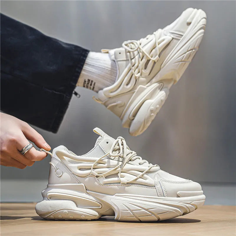 Men's beige low-top sneakers with mesh upper, platform rubber sole, and lace-up front