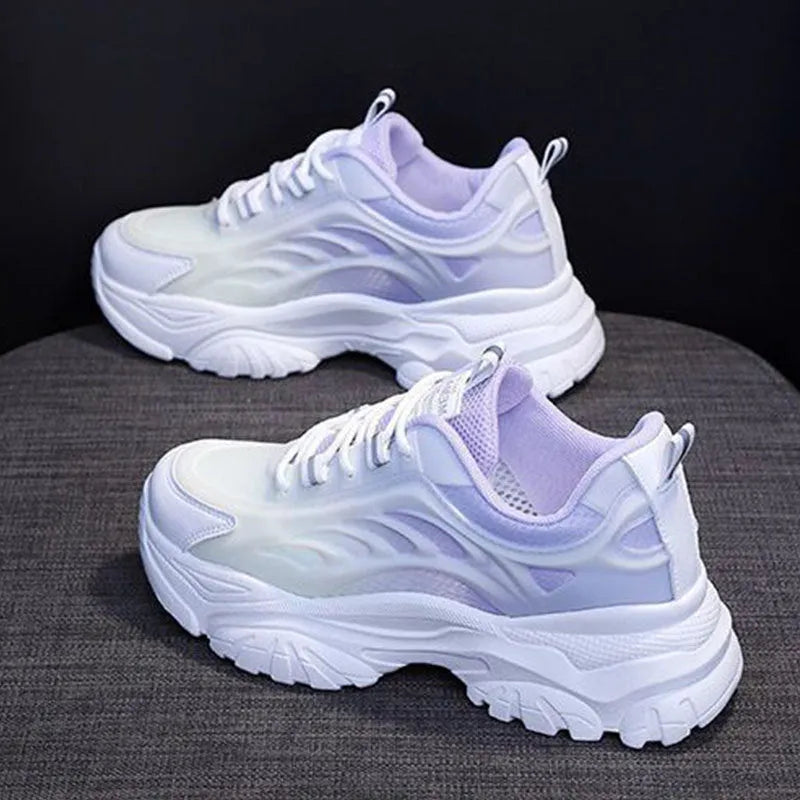 Women's round-toe lace-up casual trainer in satin, shown in pink, blue, and purple colour options.