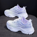Women's round-toe lace-up casual trainer in satin, shown in pink, blue, and purple colour options.