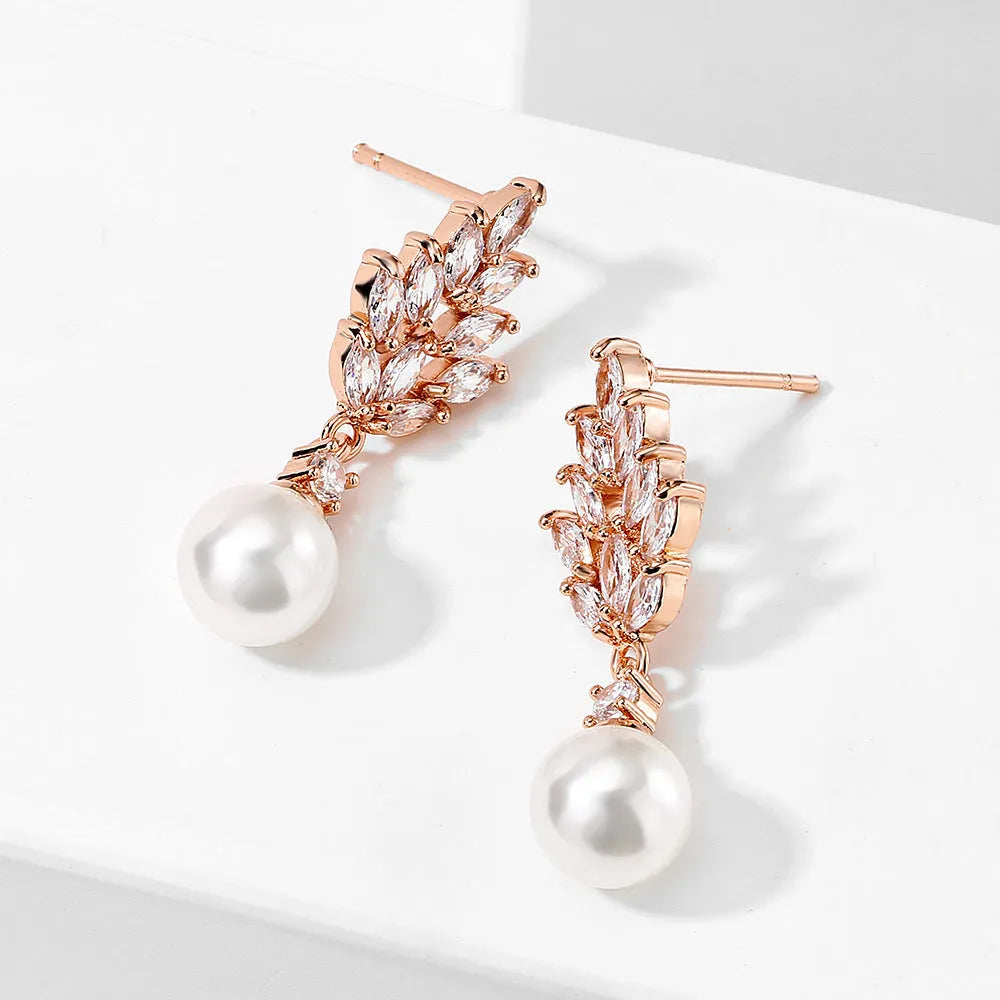 Geometric flower earrings with micro inlaid zircon and pearl accents in gold, white gold, and rose gold plating options