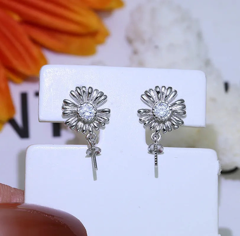 Baroque style S925 sterling silver earrings with ornate open frame and a shepherd hook featuring a small ring holder loop.