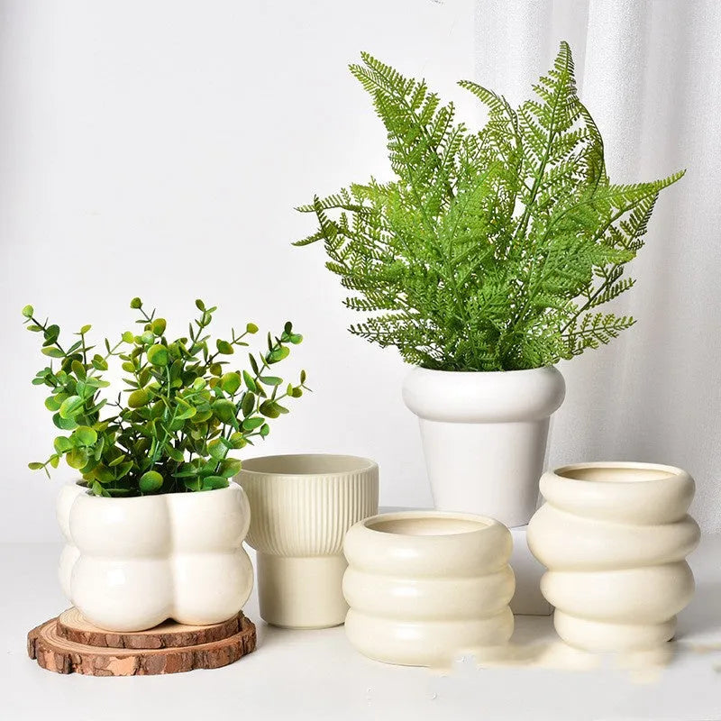 Roman column matte yellow ceramic flower pot with breathable, self-absorbent design for indoor plants