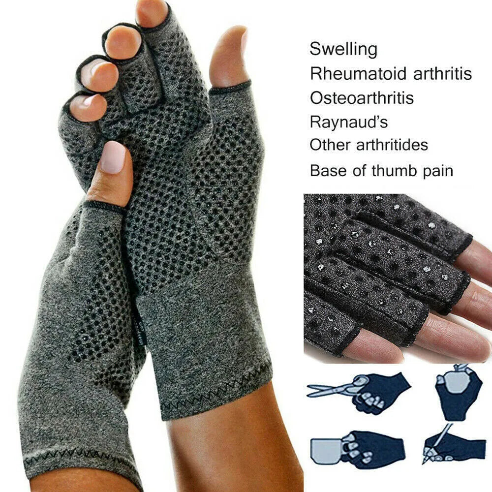 Grey half-finger joint compression gloves with anti-slip palm on a flat surface.