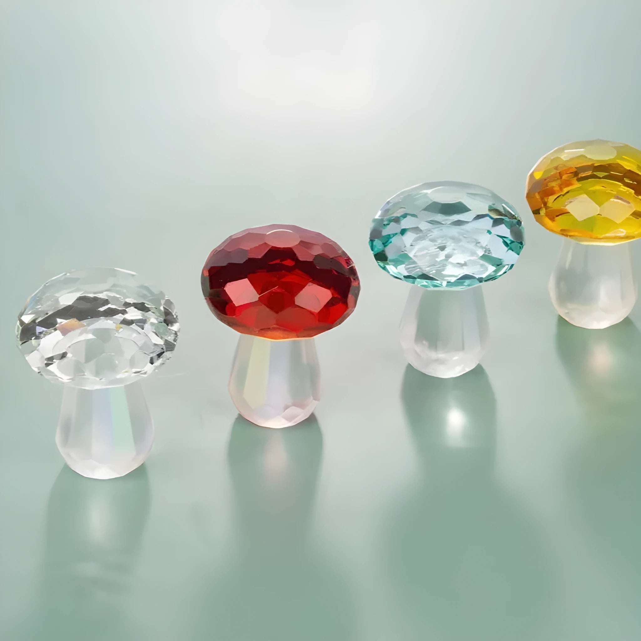 Small decorative crystal mushroom ornament in modern geometric style on a plain background.