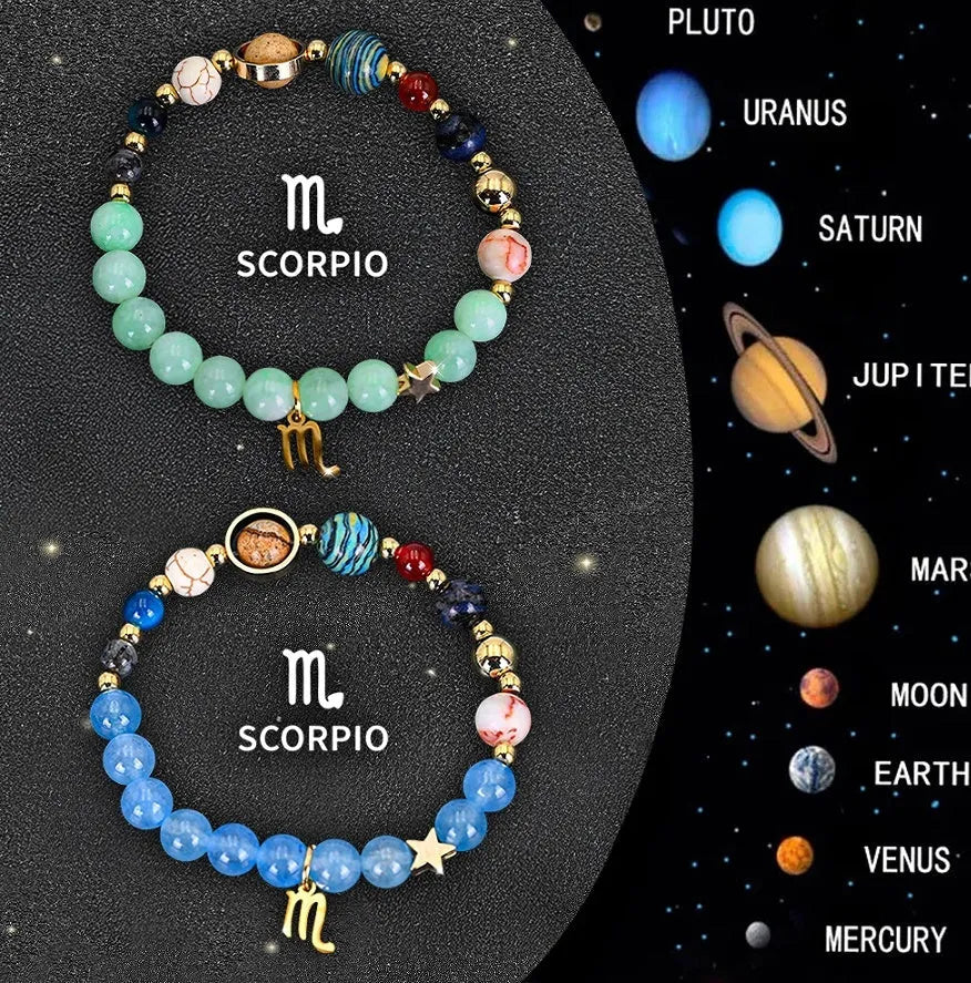 Two natural stone beaded bracelets with adjustable cords on a table, showing different zodiac sign designs.