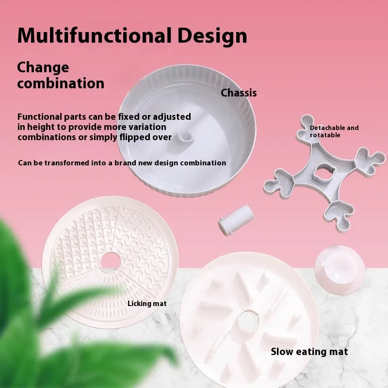Grey pet slow feeder bowl with rotating windmill-pattern top and a white anti-choke silicone pad in the centre.