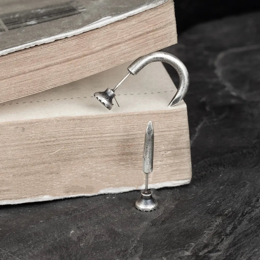 Sterling silver S925 nail-shaped stud earrings in straight and curved designs for punk fashion