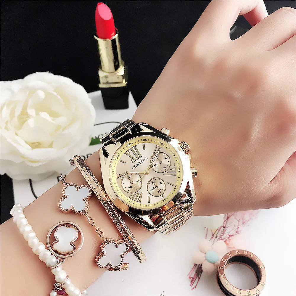 Women's silver rose gold watch with diamond details and mesh strap