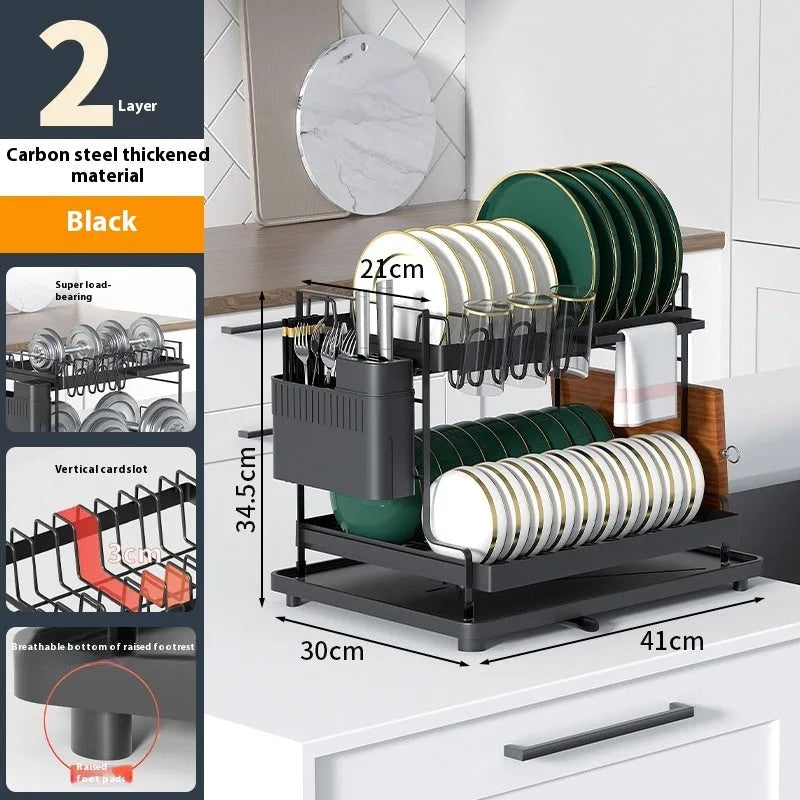 White double-layer carbon steel kitchen draining and storage rack holding plates and utensils.