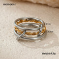 Stacked stainless steel rings with 18K gold plating in an exaggerated silhouette design.