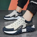 Men's breathable lightweight non-slip running shoes with artificial leather and fabric upper, low top design