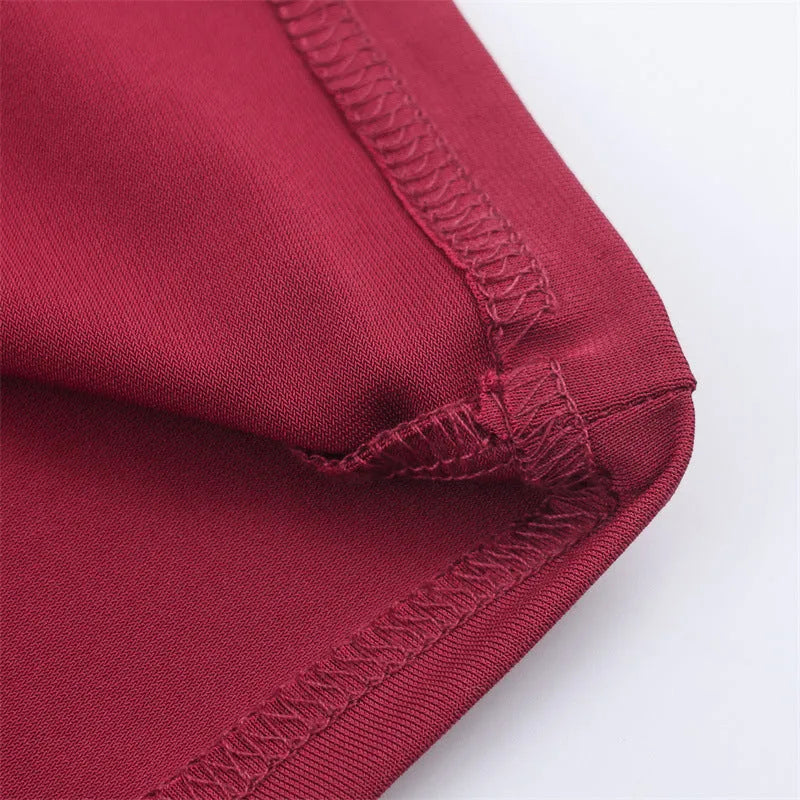 Women's red cotton pleated long dress with asymmetric skirt and stripe pattern on model