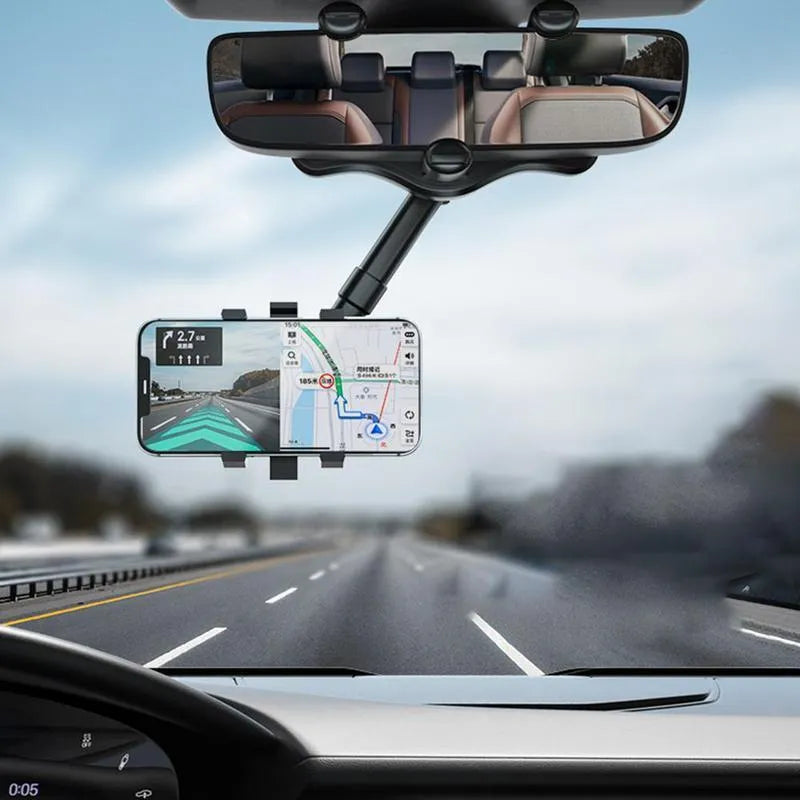Black rearview mirror phone holder with telescopic arm and 360-degree rotating head mounted on a car mirror.
