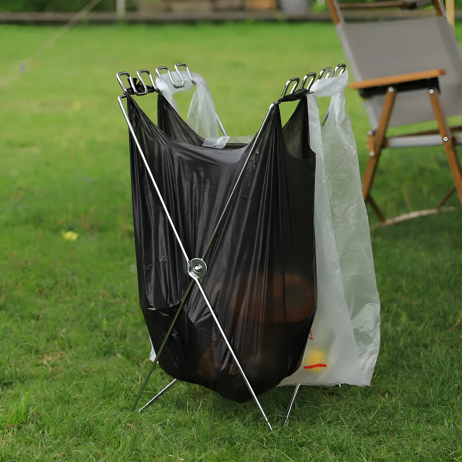 Silver folding garbage bag bracket with adjustable stainless steel frame for camping use
