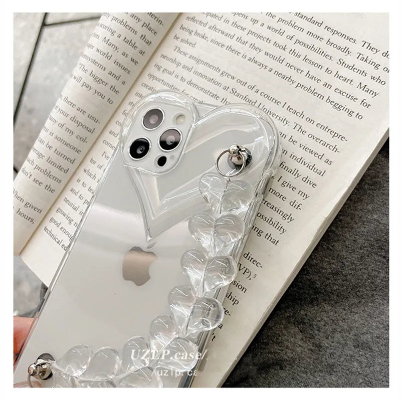 Transparent iPhone case with love heart chain bracelet design on soft TPU material