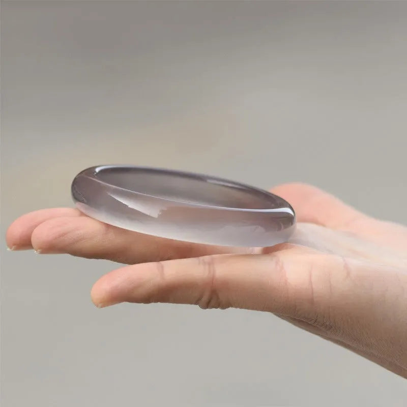 Dark grey iced chalcedony agate women's bracelet with circle, ring and line design elements