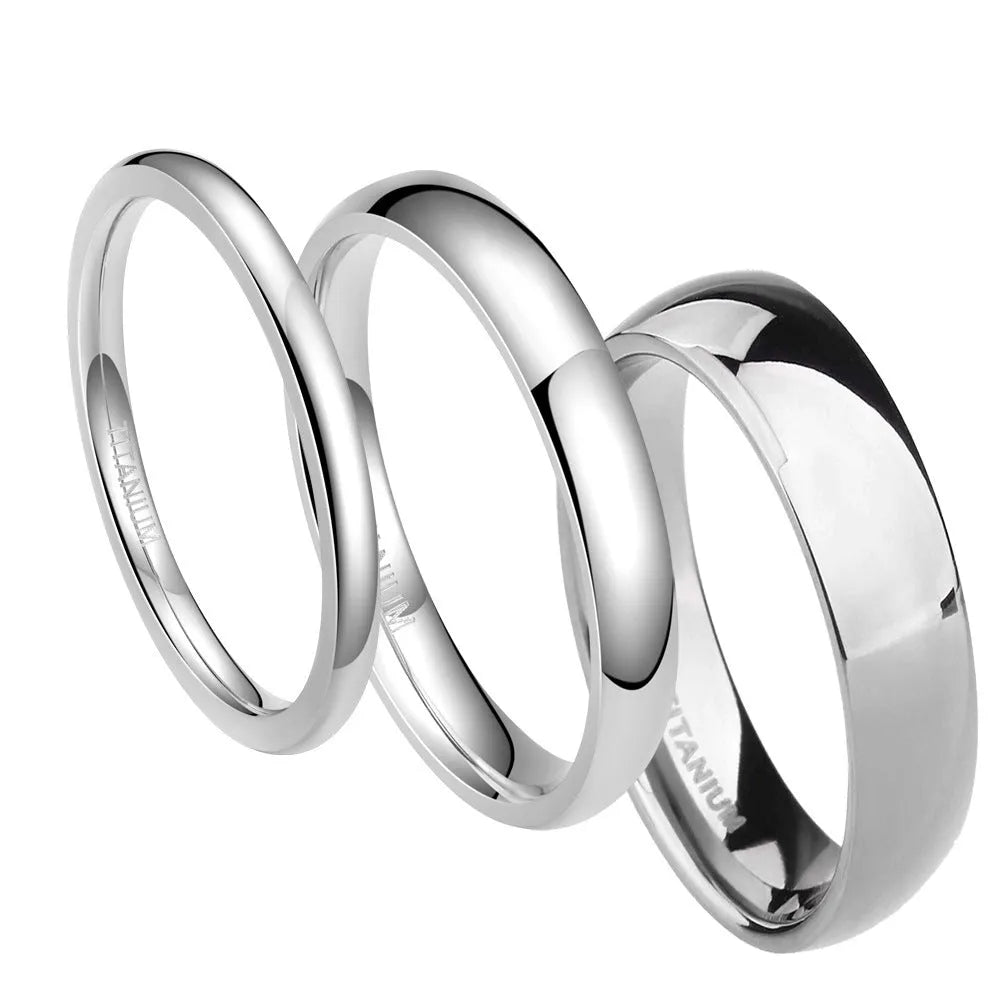 A simple silver-coloured titanium steel ring showing three width options: slim 2mm, standard 4mm, and wider 6mm band.